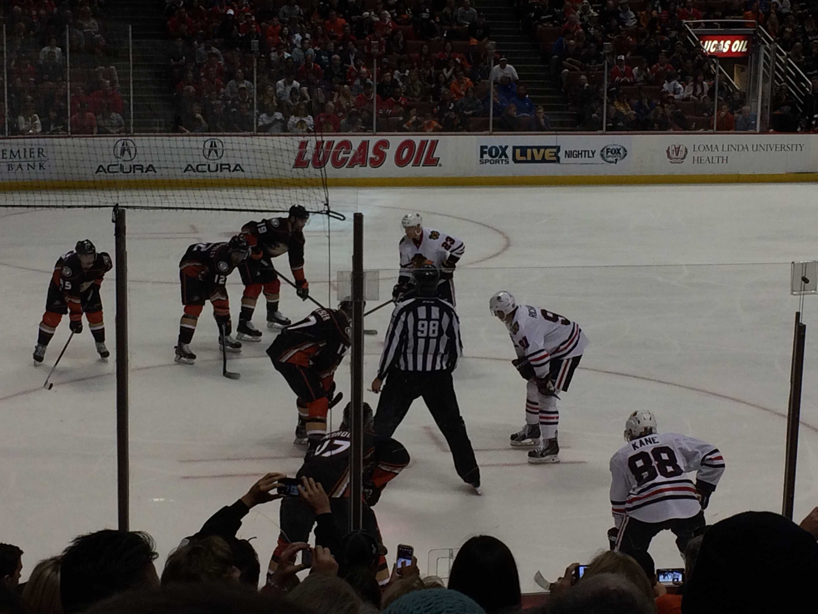 Center Ryan Kesler faces off against the Blackhawks’ Brad Richards in the regular season.