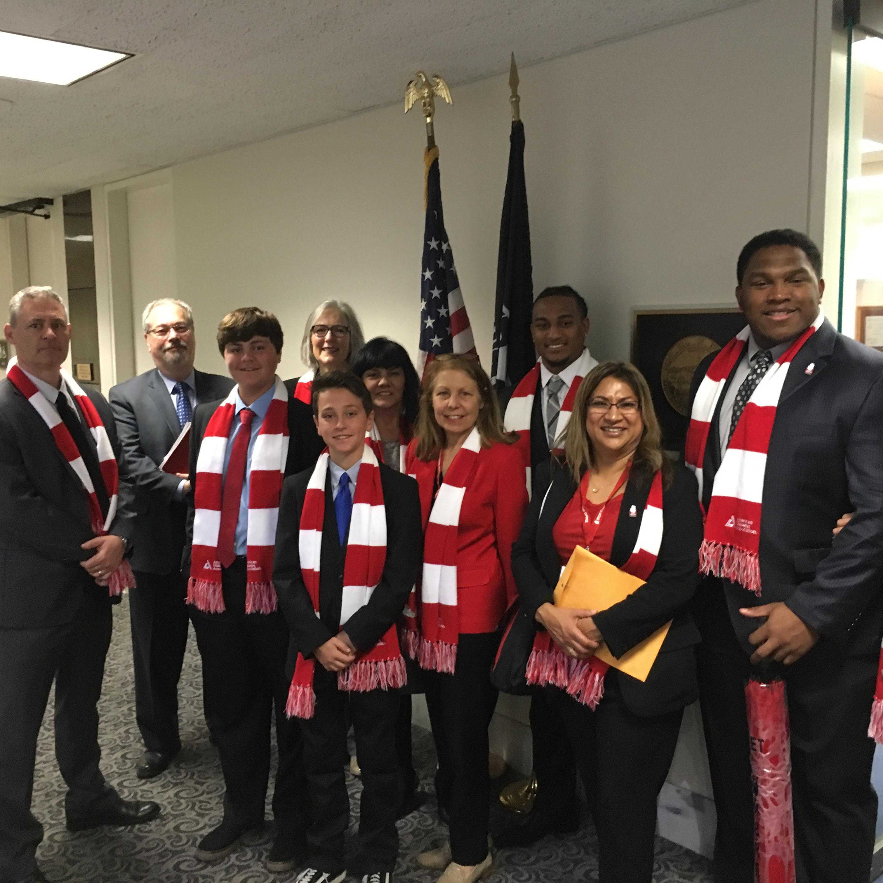 Cullen Darius (third from left) discussed government policies with Senator Feinstein as an advocate of ADA.