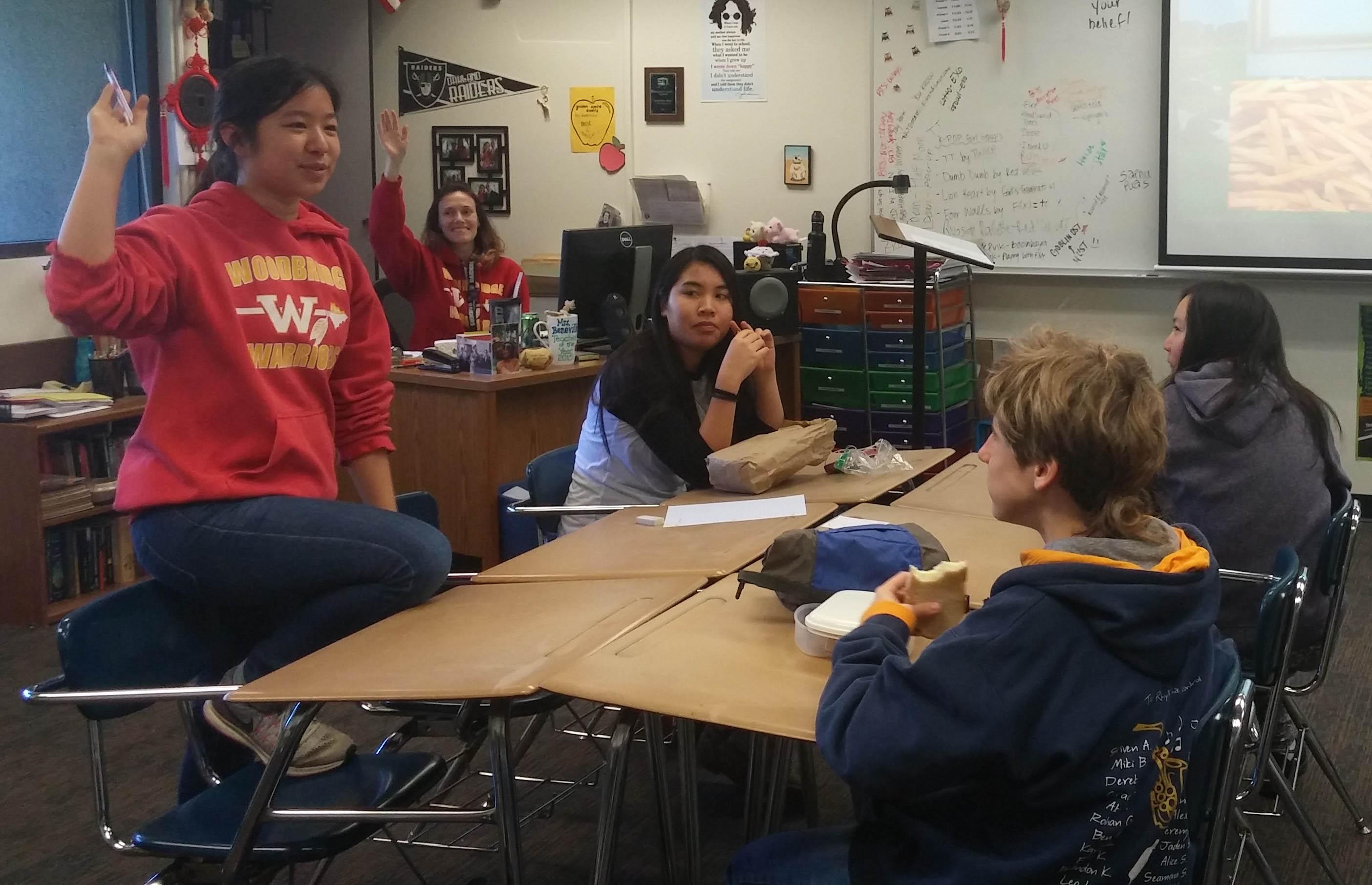 Junior Jody Lin leads the students into creative activities to improve their writing skills.
