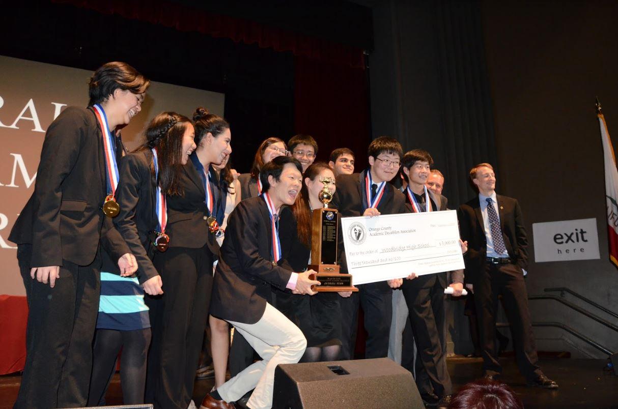 Academic Decathlon members express their jo and excitement in receiving a $3,000 scholarship for the school and having numerous members winning scholarships themselves.