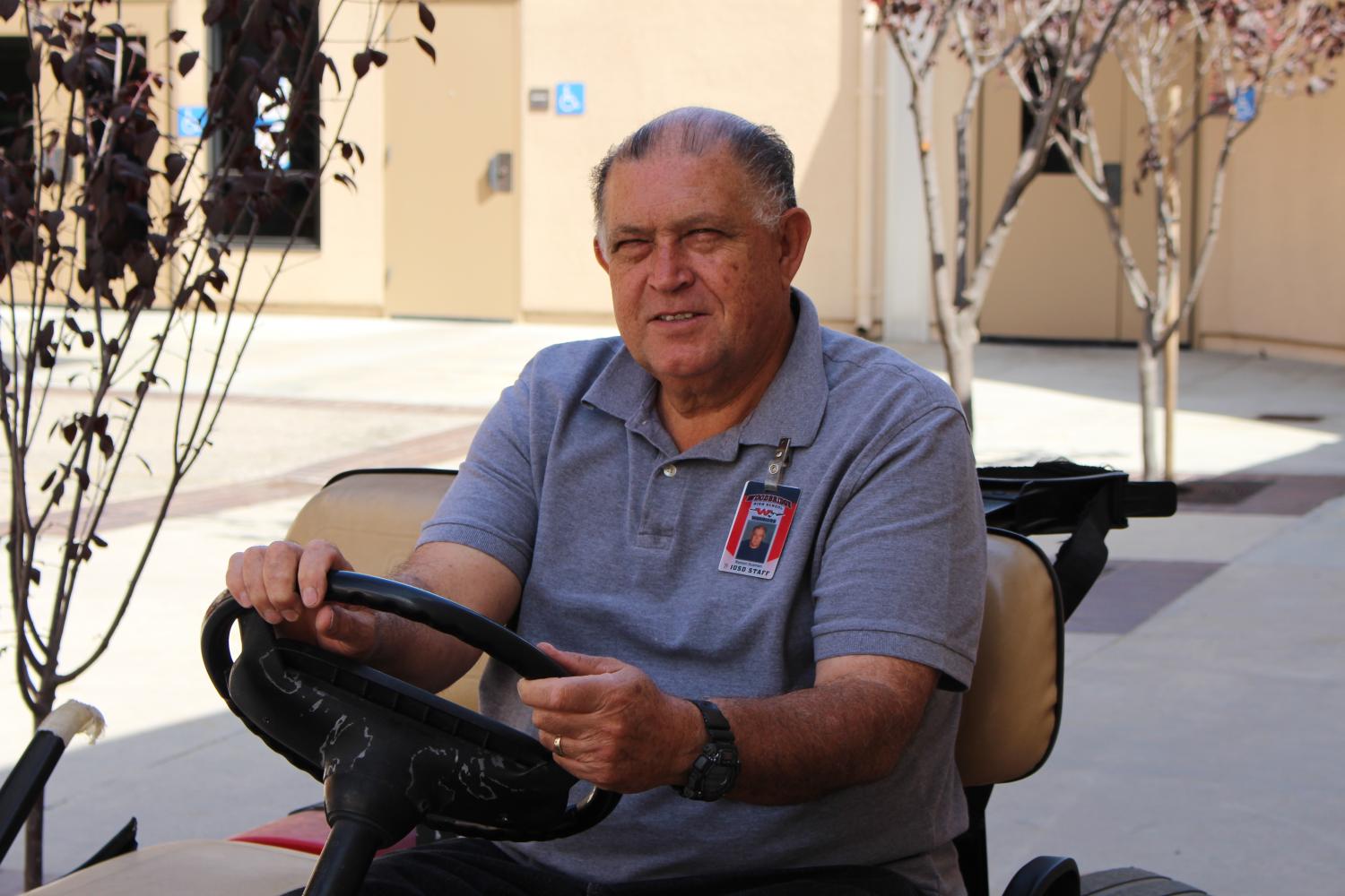 Ramon Guzman, Woodbridge’s plant supervisor of 32 years, poses for a picture of remembrance before his retirement of his commitment and service to Woodbridge High.