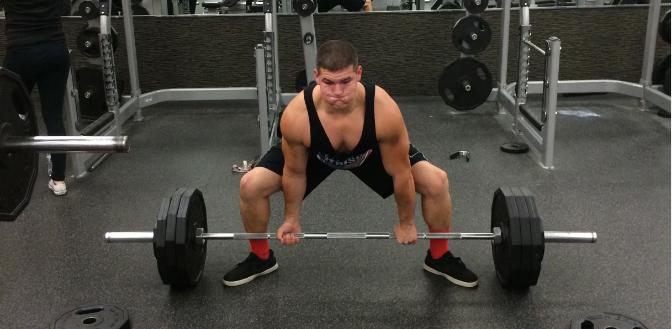 Senior Zach Bartell trains for the powerlift (deadlift) at LA Fitness. 
