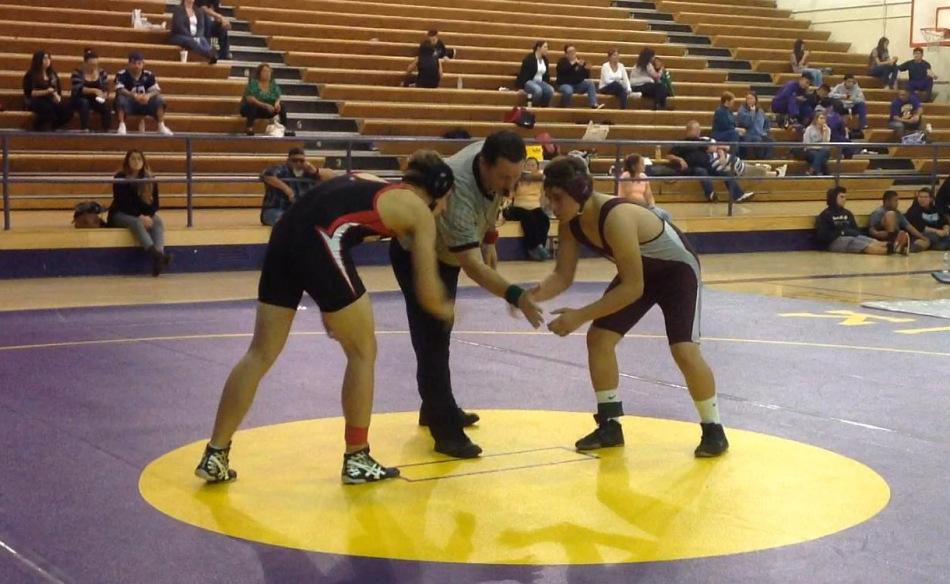 Chandler Herbert shakes hands with his opponent during the Norwalk tournament.