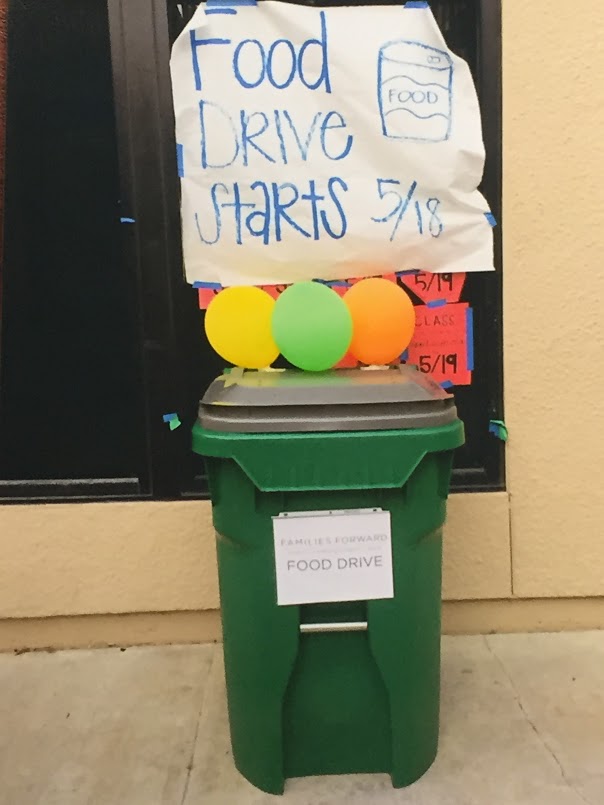 Students show gratitude by donating food to the less fortunate.