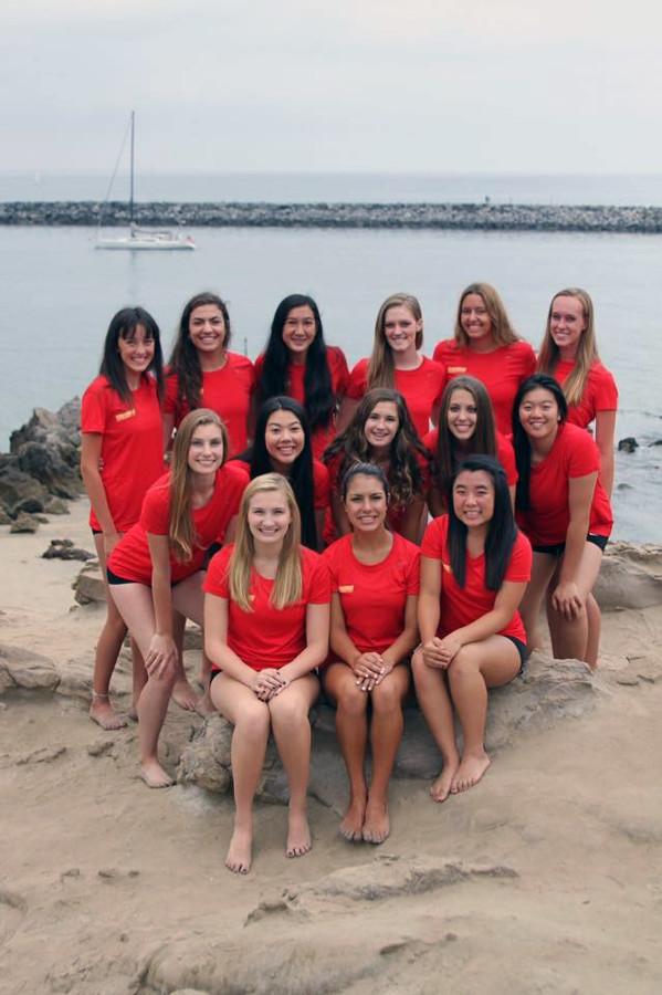The 2015-2016 varsity girls volleyball team take their team photo at Corona del Mar beach.