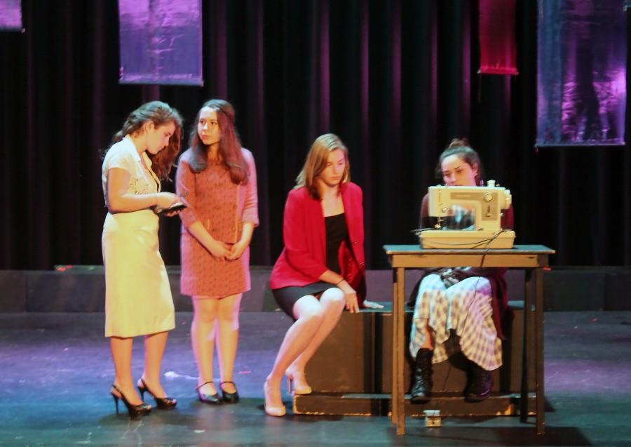 Juniors Jessica McClintock, Emma Munguia, seniors Renee Roeder and Gabriela Tatone perform onstage. 