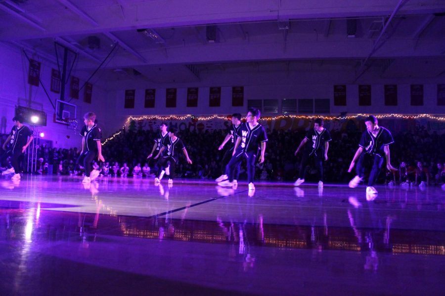 Dance+team+displays+a+combined+effort+at+the+winter+pep+rally.+