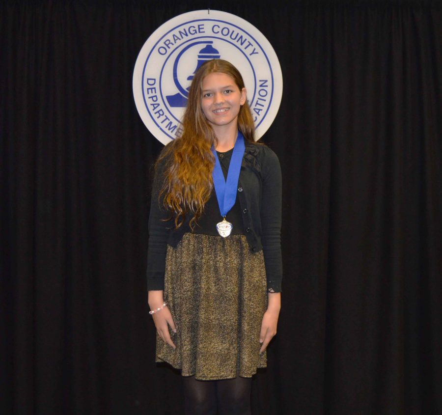 Freshman Naomi Hampton posed with a medal from the competition. 