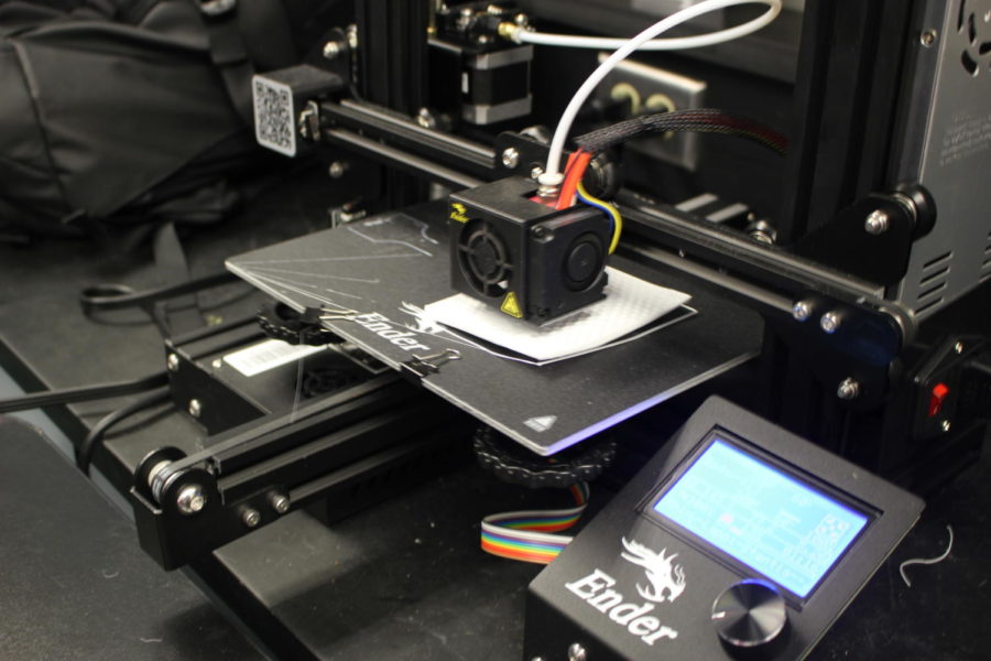 Students use a 3D printer in order to execute their projects in class.
