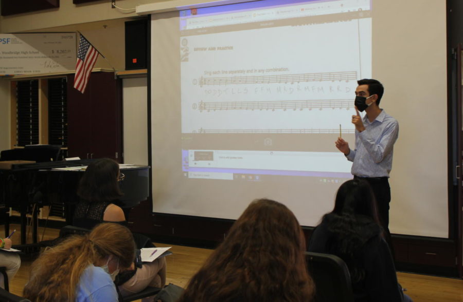 Jim Blackett, choir 
director, teaches music notes and have 
conversations with students on vocal improvement.