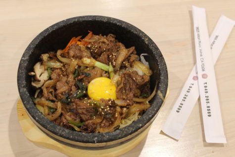 Woomiok is an authentic Korean restaurant, and one of their signature dishes is the simmering Bulgogi over rice in a hot stone bowl.