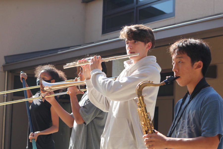 Gabrielle Humphrey, Stephen Agcopra, Aiden Gerrish and Nathaniel Cho line up as they practice for their upcoming tournament.