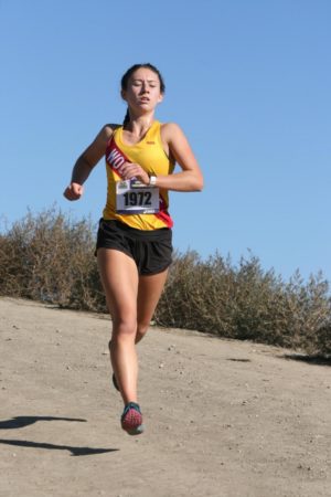 Abby Biber breathlessly runs down the dirt at Woodward Park in Fresno.