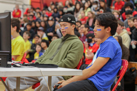 Juniors Joshua Moon and Ezra Kim warm up for the Super Smash Tournament for Clash of the Classes.
