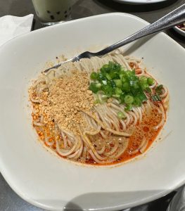 Din Tai Fung’s Spicy Noodles are bursting with flavor from their vibrant sauce. 