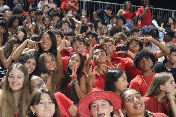 Woodbridge High Warriors at the first home game of the year celebrate the start of football season.