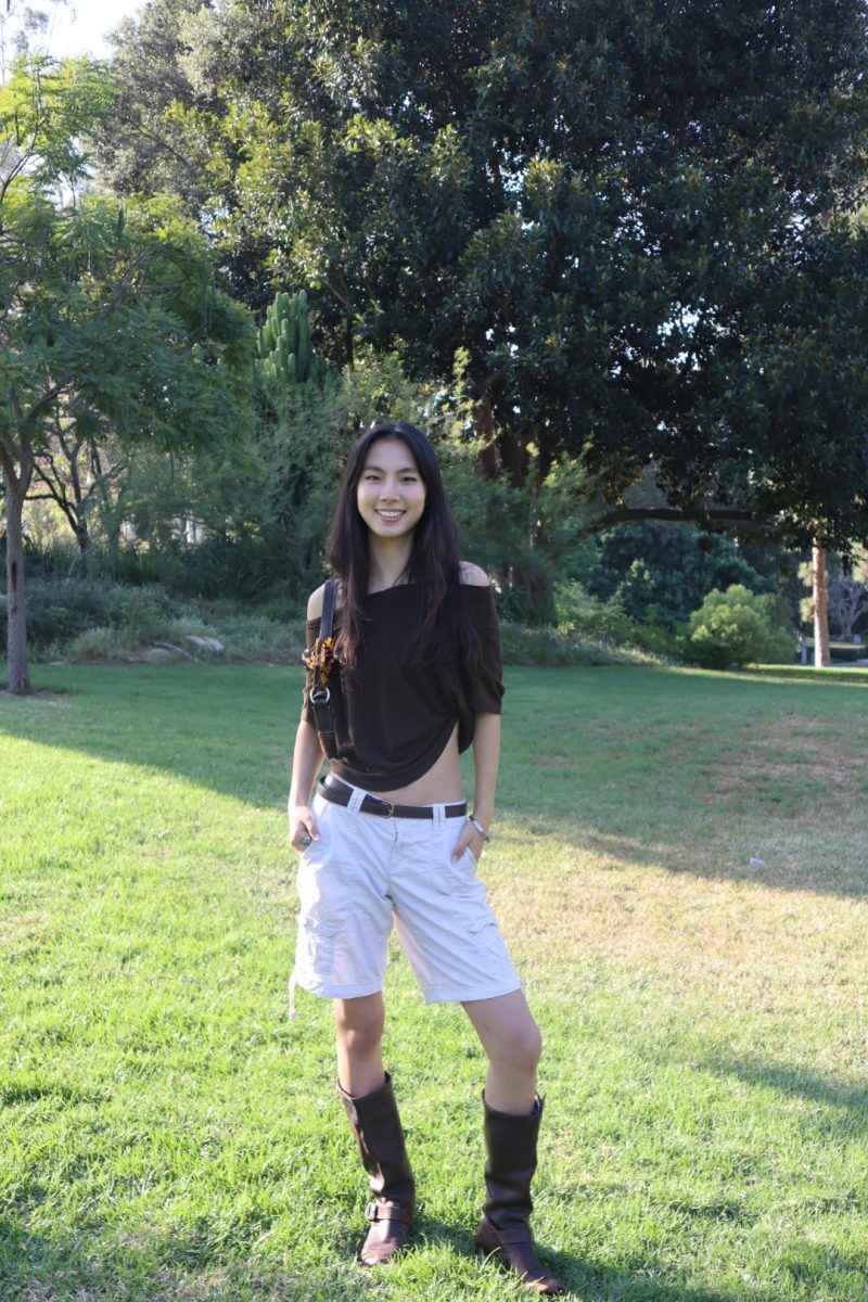 Junior Chelsea Wang shows off her transition outfit from summer to fall.