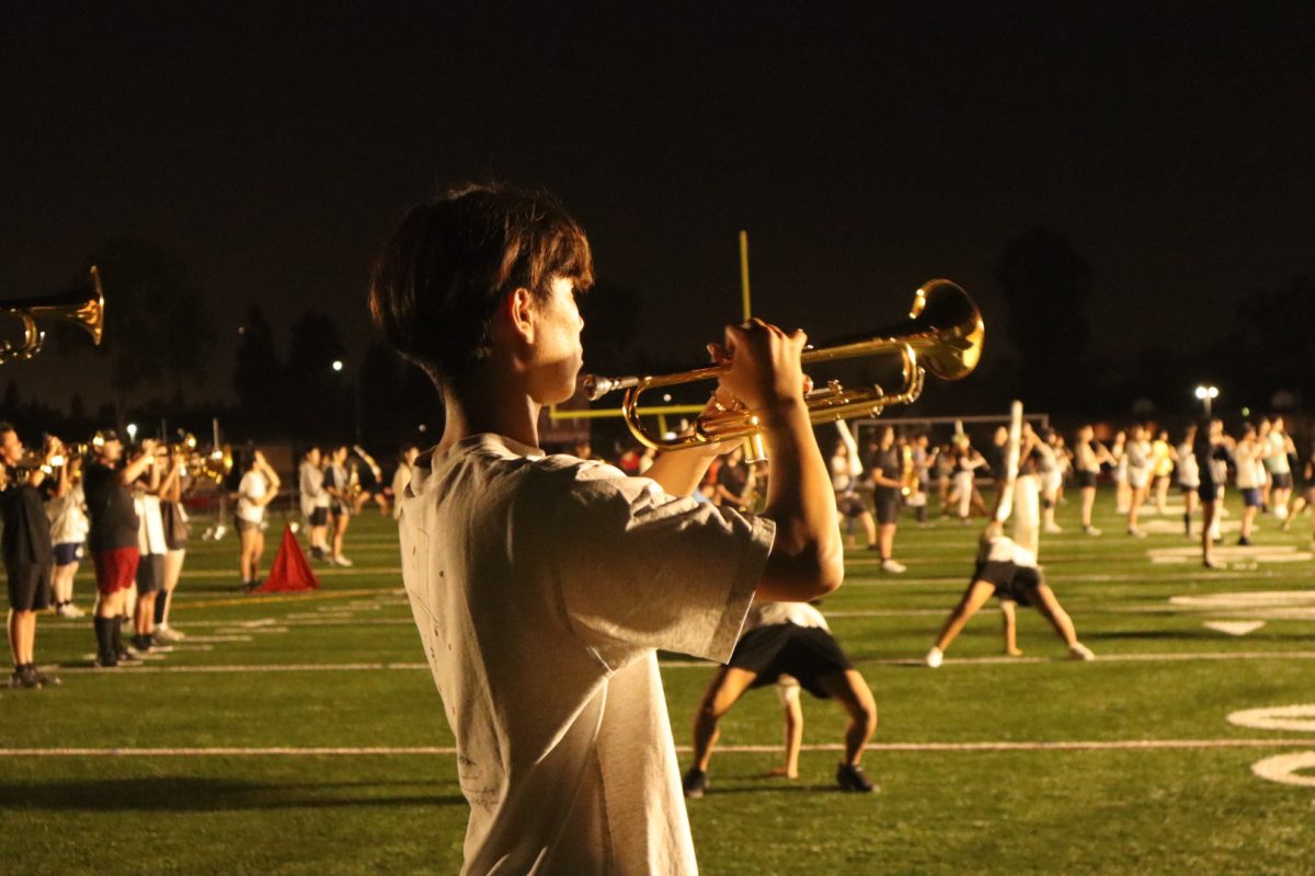 Woodbridge High’s Entertainment Corps
practices for the Irvine Unified School
District (IUSD) Band Spectacular.