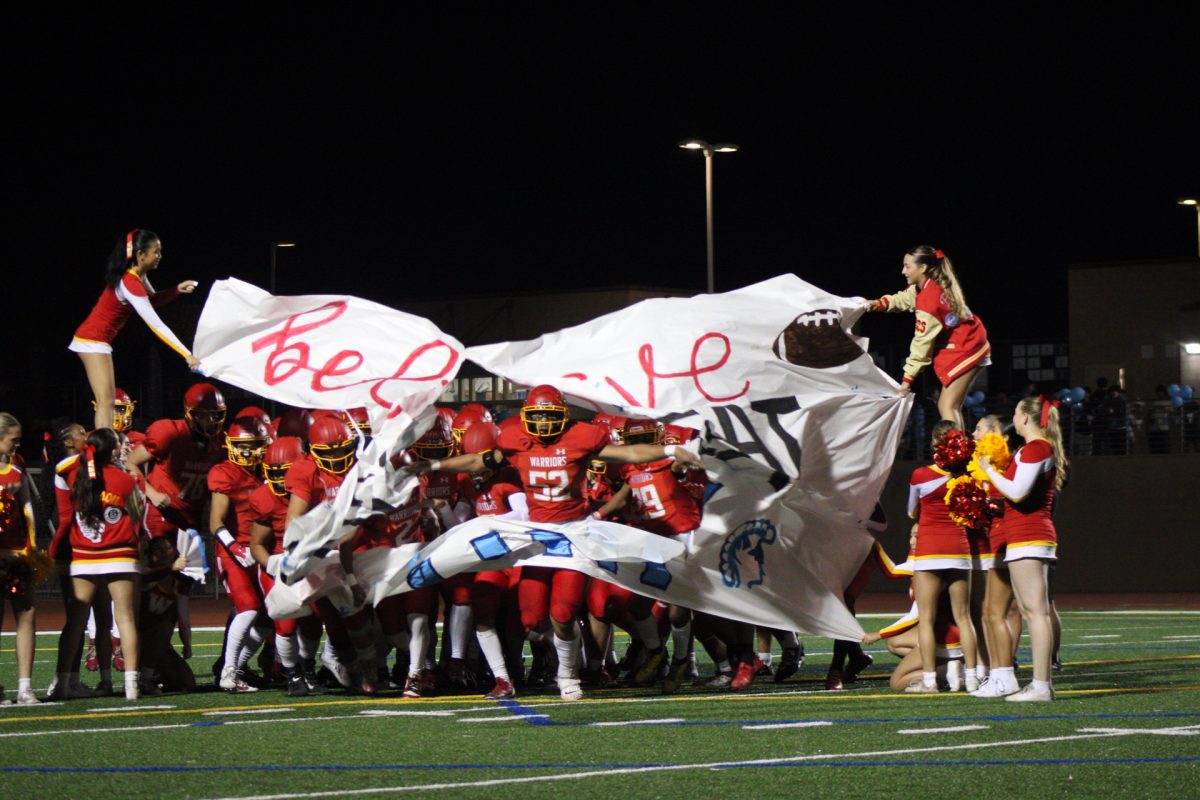 Woodbridge High’s Varsity Football
played their Red Out Rivalry football
game against University High on Oct. 25.