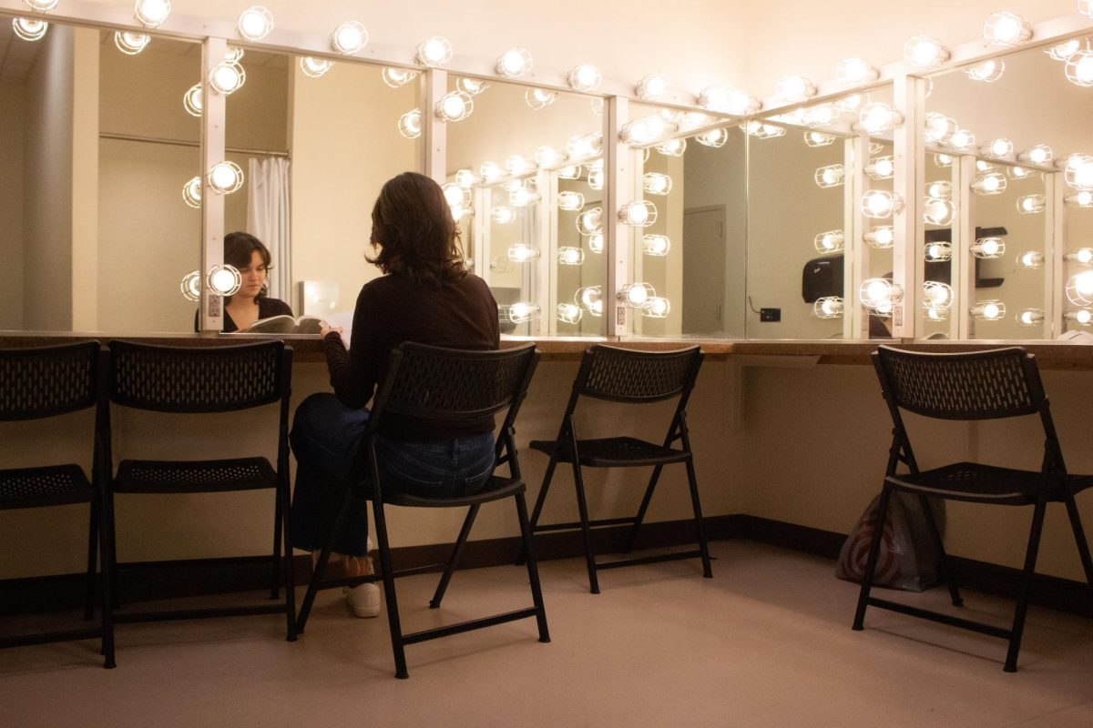 Actor Salem Romero rehearses their lines in the dressing room of the PAC.
