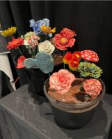 Beautiful flowers which
are handcrafted from
clay, show the creativity
and beauty the artist
wanted to showcase.
